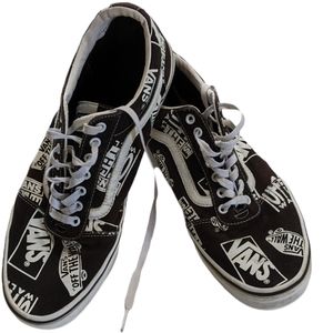 Vans, black and white logo slip on sneakers. Size 13